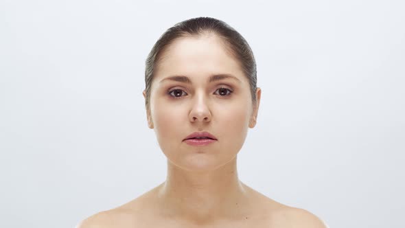 Studio portrait of young, beautiful and natural blond woman