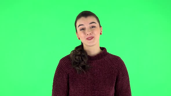 Cute Girl with Wow Face Expression and Tender Smiling. Green Screen