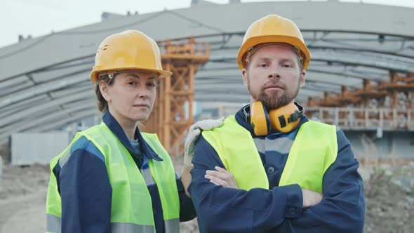 Portrait of Male and Female Construction Workers