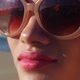 Young woman adjusting sunglasses - VideoHive Item for Sale