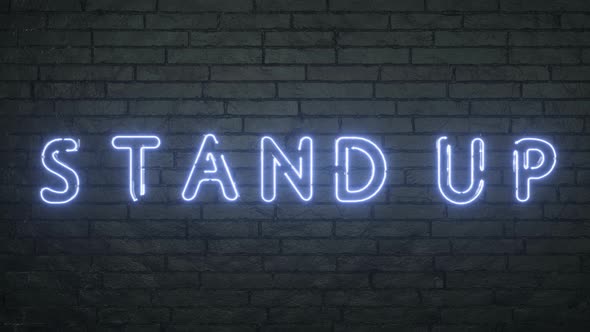 Stand Up Neon Sign on Black Brick Wall Background