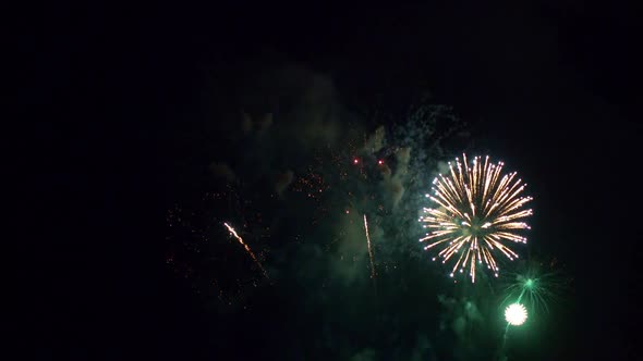 Colorful Firework display at night on sky background