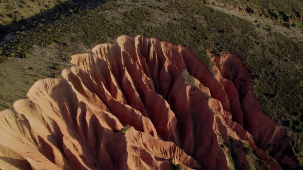 Drone aerial view of Las Cárcavas sharp sand rocks In Madrid, Spain.