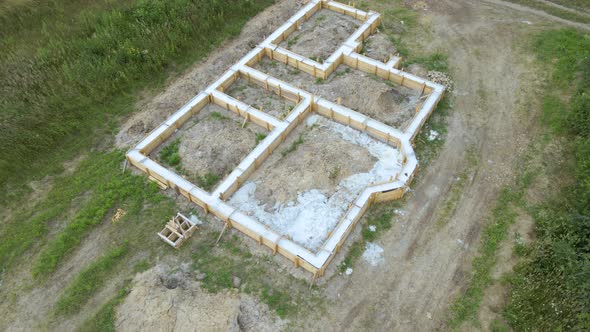 Aerial View of Building Works of New House Concrete Foundation on Construction Site