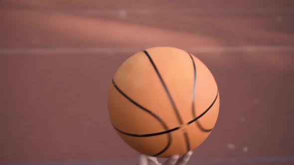 Trick with a Spinning Basketball Ball on Finger Attempt in Slow Motion