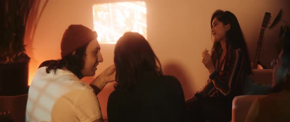 Couple feeding one another with pizza slices