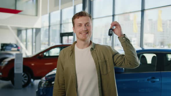 Happy Man with Car Keys in His Hands