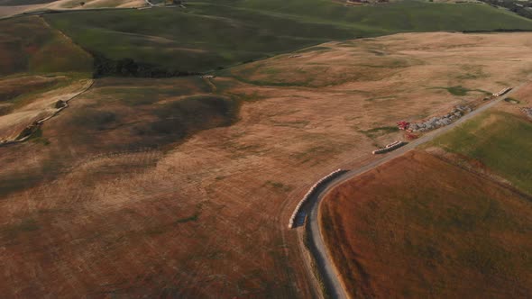 Aerial shot of a hilly countryside Val d'orcia ,TUSCANY,ITALY