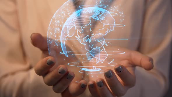 Young Woman Hold A Hologram Rotating Planet In Her Hands