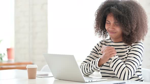 Tired African Woman with Laptop Having Wrist Pain