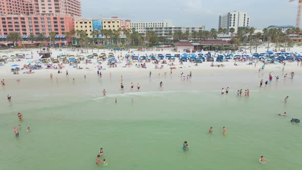 Crowded beach in Clearwater Florida, beautiful white sand, spring break, aerial