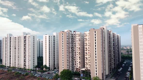 Drone Moving Towards Building on a cloudy day in India