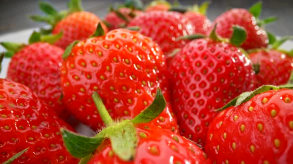 Flying Above Some Giant Sweet Red Strawberries. Detail of Tasty and Healthy Seasonal Berries. Slider