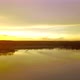 Beautiful Forest Lake Sunset Aerial with Vibrant Fall Season Colors Establishing Panning Shot - VideoHive Item for Sale