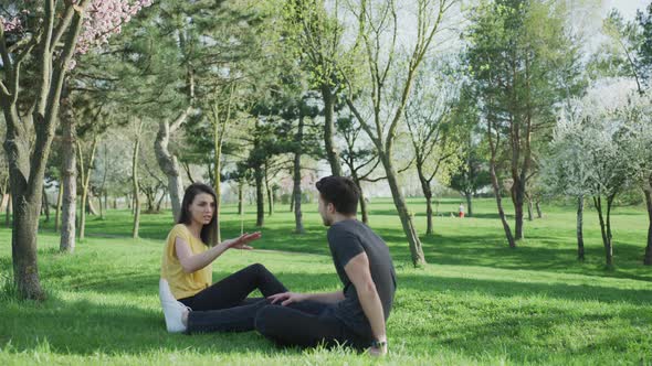 Couple talking in a park