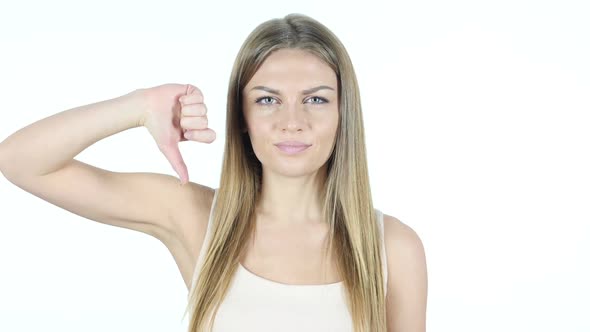 Thumbs Down By Beautiful Woman, White Background