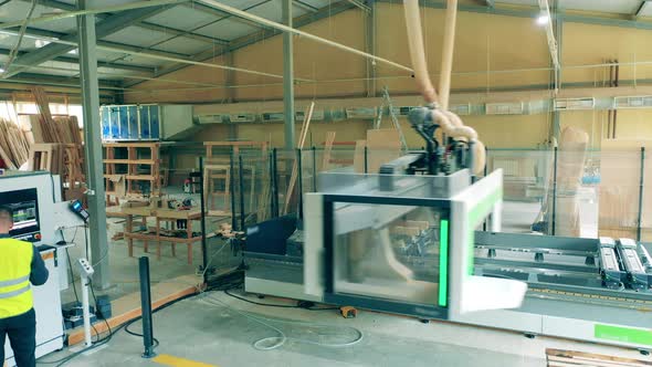 Automated Machine Works at Woodworking Plant