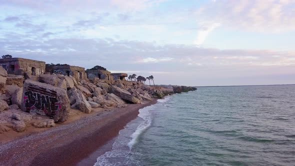 Aerial view of abandoned seaside fortification buildings at Karosta Northern Forts on the beach of B