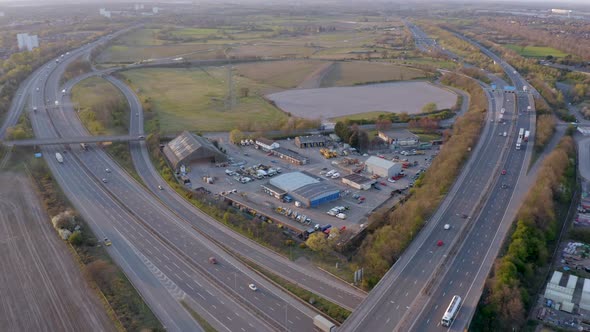 A Motorway Depot Sat Between Highways at Sunset