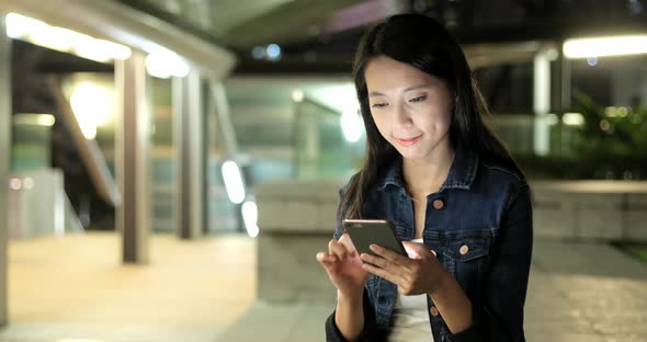 Woman looking at mobile phone 