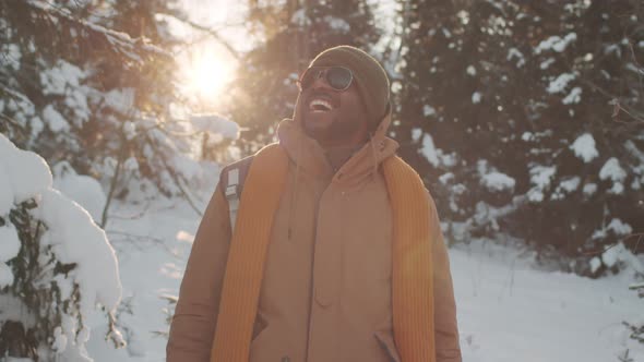 African American Man In Winter Forest