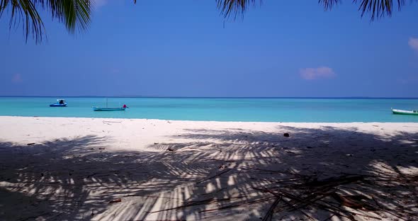 Tropical drone abstract view of a white paradise beach and blue water background in vibrant 4K