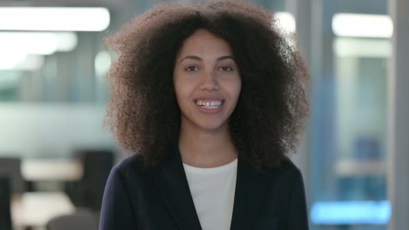 Portrait of African Businesswoman Talking on Online Video Call