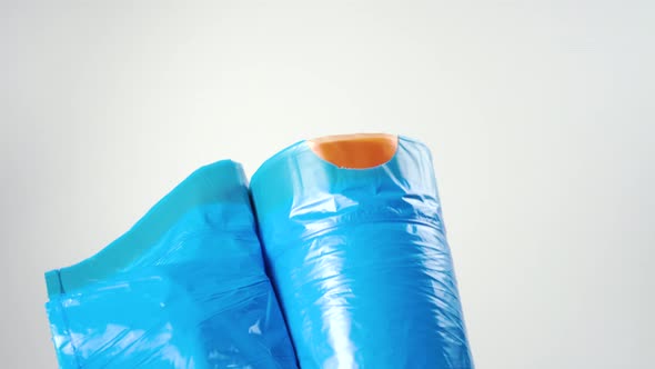 Blue roll of garbage plastic recycled bags 