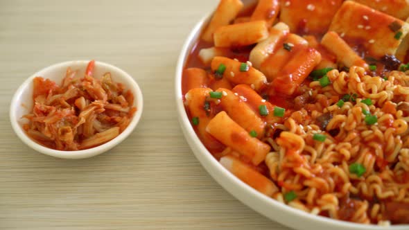 Korean instant noodles with Korean rice cake and fish cake and boiled egg - Rabokki - Korean food st