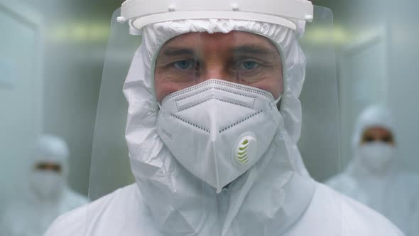 Portrait of Male Hospital Worker in Protective Uniform