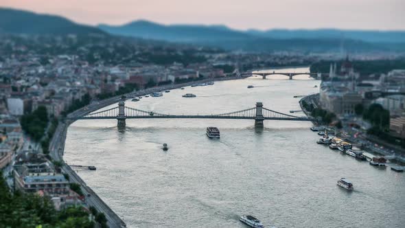 River With Bridges and Cruise Ships Sailing, Sky Reflection in Water, Urban View