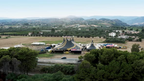 Yellow and Black Circus Tent in the Nature Aerial View