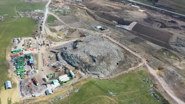 Garbage pile in trash dump or landfill near Cluj-Napoca, Romania.Pollution concept. Drone view.