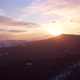 Aerial View of Winter Sunset Over Alpine Silhouette Mountains - VideoHive Item for Sale