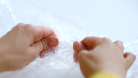 ASMR Woman Presses Plastic Bubble Wrap As a Stress Relief