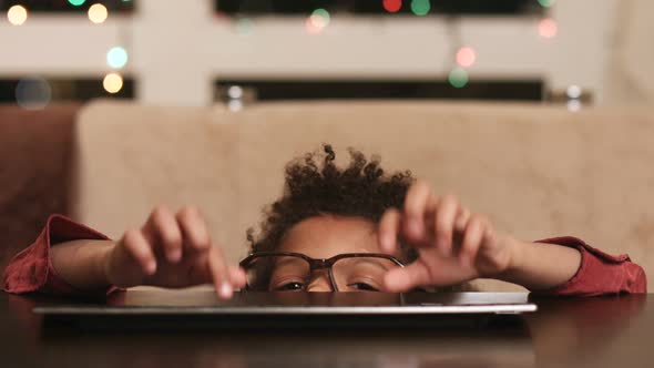 Boy Hiding and Typing Text.