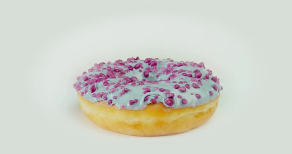 Picture of Mouth Watering Donut with White Cover and Pink Sprinkle