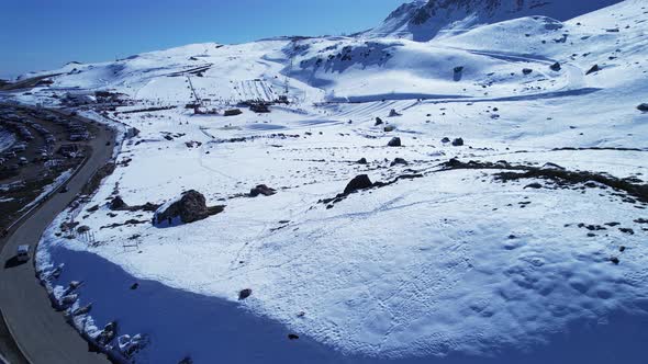 Panoramic view of Ski station centre resort at snowy Andes Mountains.