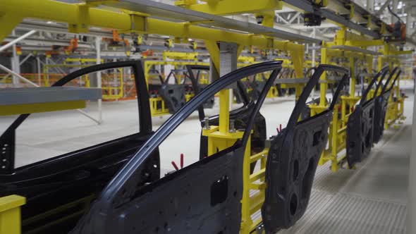 Automobile Plant, Modern Production of Cars, Transportation of Ready Car Doors on the Production