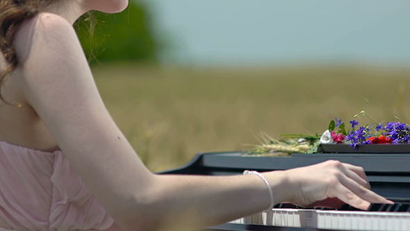 Girl Playing the Piano in Wheat Field 2