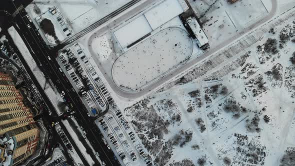 A Lot of People Skate on the Ice Rink in Open Street