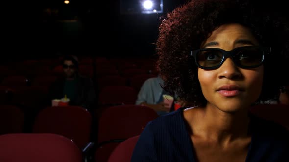 Woman in 3d glasses watching movie 4k