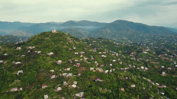 Scenic Drone Shot of Mount Sameba and Smeba Holy Trinity Church on It Batumi Adjara Georgia Europe