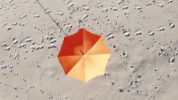 Orange Beach Umbrella on the Sand