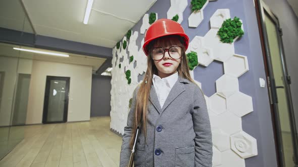 Charming Girl Wearing Suit and Hardhat