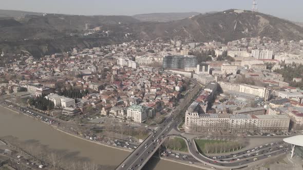 Tbilisi, Georgia - October 25 2021: Flying over Baratashvili bridge in the center of Tbilisi