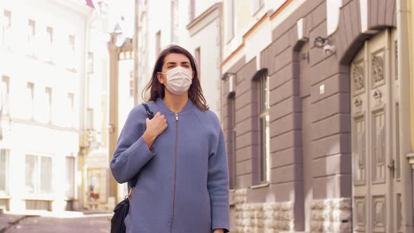 Woman Wearing Medical Mask Walking in City