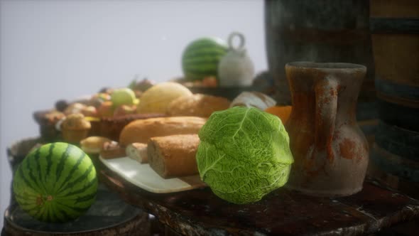 Food Table with Wine Barrels and Some Fruits Vegetables and Bread