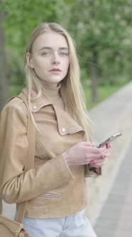 Vertical Video of a Young Skinny Girl in the Park