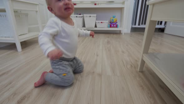 1 Year Old Baby Boy Learning to Walk Fell on His Back and Cries Toddler Exploring Home Curious